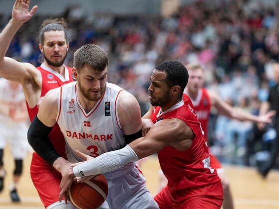 Denmarks Asbjoern Midtgaard and Norways Chris Ebou Ndow Denmark meet Norway in a European Championship qualifier in basketball, played in Naestved, Thursday 24 February 2022, Naestved Denmark  Copyright: fotograf@clausbech.dk ClausxBechx Cop10173 spdk20220224-213100-L