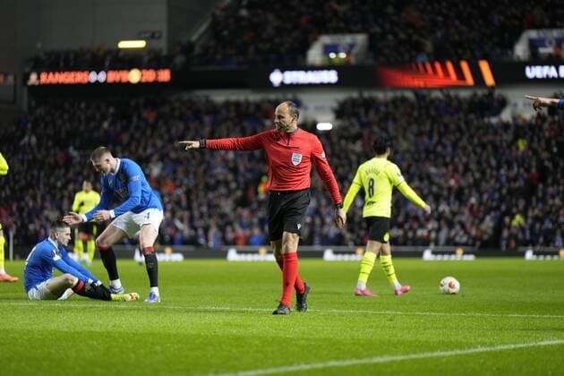 Mandatory Credit: Photo by Stuart Wallace Shutterstock (12820548g) Referee Antonio Miguel Mateu Lahoz points to the penalty spot after Ryan Kent of Rangers was fouled inside the box by Julian Brandt of Borussia Dortmund. Rangers v Borussia Dortmund, UEFA Europa League, Play-offs, Second Leg, Football, Ibrox Stadium, Glasgow, UK - 24 Feb 2022 EDITORIAL USE ONLY No use with unauthorised audio, video, data, fixture lists, club league logos or live services. Online in-match use limited to 120 images, no video emulation. No use in betting, games or single club league player publications. Rangers v Borussia Dortmund, UEFA Europa League, Play-offs, Second Leg, Football, Ibrox Stadium, Glasgow, UK - 24 Feb 2022 EDITORIAL USE ONLY No use with unauthorised audio, video, data, fixture lists, club league logos or live services. Online in-match use limited to 120 images, no video emulation. No use in betting, games or single club league player publications. Copyright: xStuartxWallace Shutterstockx 12820548g