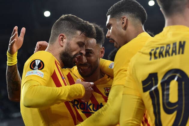 Gerard Pique of Barcelona celebrates with teammates after scoring the goal of 1-3 during the Europa League Knock-out Play-off Second leg football match between SSC Napoli and FC Barcelona, Barca at Diego Armando Maradona stadium in Napoli (Italy), February 24th, 2021. Photo Andrea Staccioli Insidefoto andreaxstaccioli