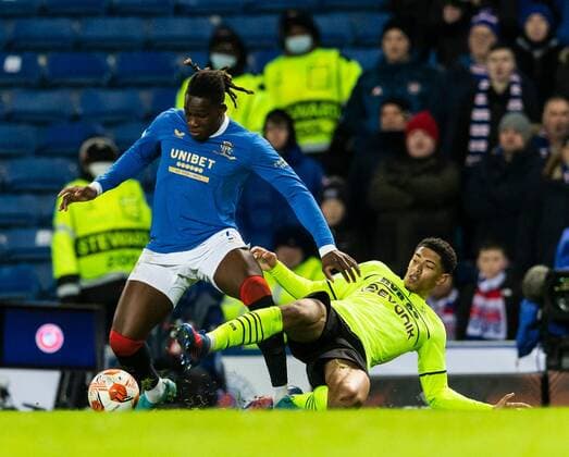 Mandatory Credit: Photo by Luke Nickerson Rangers FC Shutterstock (12821152v) Rangers Defender Calvin Bassey is tackled by Borussia Dortmund Midfielder Jude Bellingham Rangers v Borussia Dortmund, UEFA Europa League, Play-offs, Second Leg, Football, Ibrox Stadium, Glasgow, UK - 24 Feb 2022 Rangers v Borussia Dortmund, UEFA Europa League, Play-offs, Second Leg, Football, Ibrox Stadium, Glasgow, UK - 24 Feb 2022 Copyright: xLukexNickerson RangersxFC Shutterstockx 12821152v