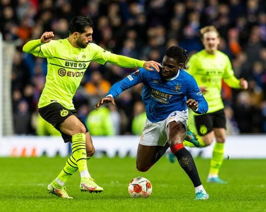 Mandatory Credit: Photo by Luke Nickerson Rangers FC Shutterstock (12821152aa) Rangers Defender Calvin Bassey is fouled by Borussia Dortmund Midfielder Emre Can Rangers v Borussia Dortmund, UEFA Europa League, Play-offs, Second Leg, Football, Ibrox Stadium, Glasgow, UK - 24 Feb 2022 Rangers v Borussia Dortmund, UEFA Europa League, Play-offs, Second Leg, Football, Ibrox Stadium, Glasgow, UK - 24 Feb 2022 Copyright: xLukexNickerson RangersxFC Shutterstockx 12821152aa