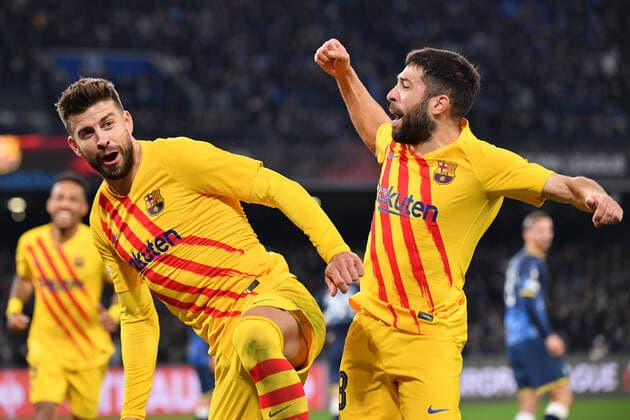 Barcelona s defender Gerard Pique celebrates with Barcelona s defender Jordi Alba after scoring the 1-3 goal during SSC Napoli vs FC Barcellona, football Europa League match in Naples, Italy, February 24 2022  Copyright: xCarmeloxImbesix xipa-agency.netx xx 0