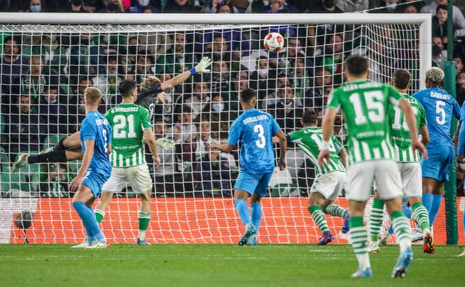 SEVILLE, SPAIN â€“ FEBRUARY 24, 2022: Zenit St Petersburg s goalkeeper Daniil Odoyevsky (L back) dives for the ball in the second leg of a UEFA Europa League playoff fooball match between Betis and Zenit St Petersburg at Benito Villamarin Stadium. Alexander Demianchuk TASS  TS1254E5