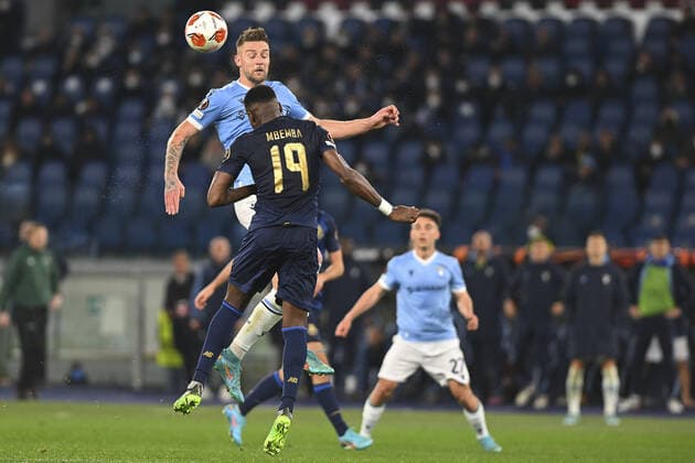 Sergej Milinkovic-Savic of SS LAZIO and Chancel Mbemba of F.C. Porto in action during the Knockout Round Play-Offs Leg Two - UEFA Europa League between SS Lazio and FC Porto at Stadio Olimpico on 24th of February, 2022 in Rome, Italy.  Copyright: xDomenicoxCippitellix xipa-agencyx xx 0