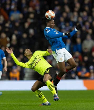 Football - 2021 2022 UEFA Europa League - Round of 32 - Second Leg - Glasgow Rangers vs Borussia Dortmund - Ibrox Stadium - Thursday 24th February 2022. Joe Aribo of Rangers vies with Jude Bellingham of Borussia Dortmund 