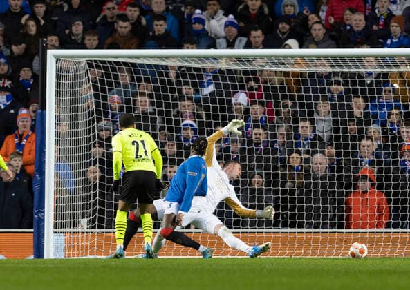Football - 2021 2022 UEFA Europa League - Round of 32 - Second Leg - Glasgow Rangers vs Borussia Dortmund - Ibrox Stadium - Thursday 24th February 2022. Donyell Malen of Borussia Dortmund scores to make it 2-1 to Borussia Dortmund 