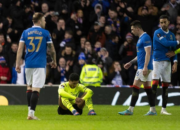 Football - 2021 2022 UEFA Europa League - Round of 32 - Second Leg - Glasgow Rangers vs Borussia Dortmund - Ibrox Stadium - Thursday 24th February 2022. Jude Bellingham of Borussia Dortmund is dejected at full time 