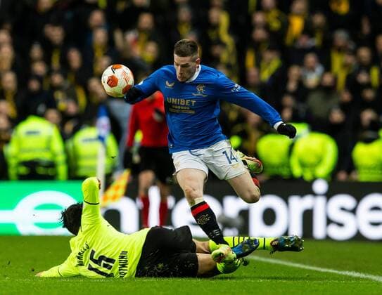 Mandatory Credit: Photo by Luke Nickerson Rangers FC Shutterstock (12821152ao) Rangers Forward Ryan Kent jumps over a challenge from Borussia Dortmund Defender Mats Hummels Rangers v Borussia Dortmund, UEFA Europa League, Play-offs, Second Leg, Football, Ibrox Stadium, Glasgow, UK - 24 Feb 2022 Rangers v Borussia Dortmund, UEFA Europa League, Play-offs, Second Leg, Football, Ibrox Stadium, Glasgow, UK - 24 Feb 2022  Copyright: xLukexNickerson RangersxFC Shutterstockx 12821152ao