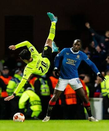 Mandatory Credit: Photo by Luke Nickerson Rangers FC Shutterstock (12821152aq) Borussia Dortmund Midfielder Reinier falls over Rangers Midfielder Glen Kamara Rangers v Borussia Dortmund, UEFA Europa League, Play-offs, Second Leg, Football, Ibrox Stadium, Glasgow, UK - 24 Feb 2022 Rangers v Borussia Dortmund, UEFA Europa League, Play-offs, Second Leg, Football, Ibrox Stadium, Glasgow, UK - 24 Feb 2022  Copyright: xLukexNickerson RangersxFC Shutterstockx 12821152aq