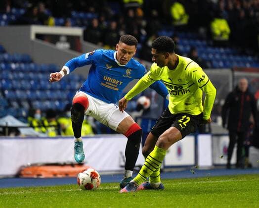 Mandatory Credit: Photo by Stuart Wallace Shutterstock (12820548y) Rangers captain James Tavernier beats Jude Bellingham of Borussia Dortmund Rangers v Borussia Dortmund, UEFA Europa League, Play-offs, Second Leg, Football, Ibrox Stadium, Glasgow, UK - 24 Feb 2022 EDITORIAL USE ONLY No use with unauthorised audio, video, data, fixture lists, club league logos or live services. Online in-match use limited to 120 images, no video emulation. No use in betting, games or single club league player publications. Rangers v Borussia Dortmund, UEFA Europa League, Play-offs, Second Leg, Football, Ibrox Stadium, Glasgow, UK - 24 Feb 2022 EDITORIAL USE ONLY No use with unauthorised audio, video, data, fixture lists, club league logos or live services. Online in-match use limited to 120 images, no video emulation. No use in betting, games or single club league player publications.  Copyright: xStuartxWallace Shutterstockx 12820548y