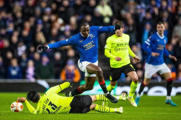 Mandatory Credit: Photo by Kirk O Rourke Rangers FC Shutterstock (12821153du) Joe Aribo of Rangers jumps over Emre Can of Borussia Dortmund during the last 32 Europa League match at Ibrox Stadium, Glasgow. Rangers v Borussia Dortmund, UEFA Europa League, Play-offs, Second Leg, Football, Ibrox Stadium, Glasgow, UK - 24 Feb 2022 Rangers v Borussia Dortmund, UEFA Europa League, Play-offs, Second Leg, Football, Ibrox Stadium, Glasgow, UK - 24 Feb 2022  Copyright: xKirkxO Rourke RangersxFC Shutterstockx 12821153du