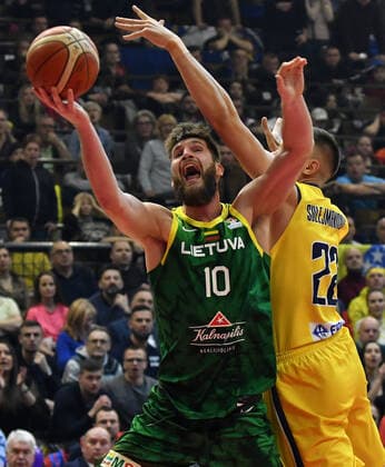 (220225) -- TUZLA, Feb. 25, 2022 -- Emir Sulejmanovic (R) of Bosnia and Herzegovina (BiH) competes against Regimantas Miniotas of Lithuania during their group F first round match of FIBA Basketball World Cup 2023 Qualifiers in Tuzla, Bosnia and Herzegovina, on Feb. 24, 2022. (Photo by Nedim Grabovica Xinhua) (SP)BOSNIA AND HERZEGOVINA-TUZLA-BASKETBALL-FIBA-BiH VS LITHUANIA Ermin 