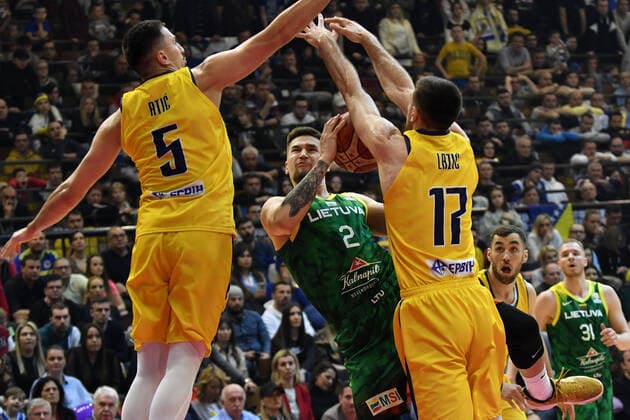 (220225) -- TUZLA, Feb. 25, 2022 -- Aleksandar Lazic (1st R) of Bosnia and Herzegovina (BiH) competes against Margiris Normantas (C) of Lithuania during their group F first round match of FIBA Basketball World Cup 2023 Qualifiers in Tuzla, Bosnia and Herzegovina, on Feb. 24, 2022. (Photo by Nedim Grabovica Xinhua) (SP)BOSNIA AND HERZEGOVINA-TUZLA-BASKETBALL-FIBA-BiH VS LITHUANIA Ermin 