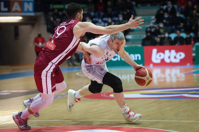 Latvian Rihards Lomazs and Belgium s Quentin Serron fight for the ball during a match between the Belgian national men team the Belgian Lions and Latvia, a qualifier match in Group A, ahead of the World Cup Basketball, Friday 25 February 2022, in Mons. VIRGINIExLEFOUR  x13792986x