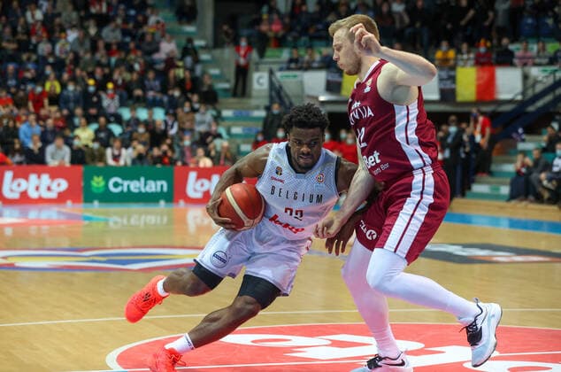 Belgium s Retin Obasohan and Latvian Arturs Strautins fight for the ball during a match between the Belgian national men team the Belgian Lions and Latvia, a qualifier match in Group A, ahead of the World Cup Basketball, Friday 25 February 2022, in Mons. VIRGINIExLEFOUR  x13805128x