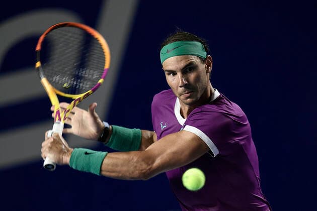 (220226) -- ACAPULCO, Feb. 26, 2022 -- Rafael Nadal of Spain hits a return during the men s singles semifinal match against Daniil Medvedev of Russia at the 2022 ATP, Tennis Herren Mexican Open tennis tournament in Acapulco, Mexico, Feb. 25, 2022. ) (SP)MEXICO-ACAPULCO-TENNIS-ATP-MEXICAN OPEN-SEMIFINALS XinxYuewei 