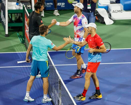 Nikola Mektic and Mate Pavic congratulate Tim Puetz in red and Michael Venus for the victory, jubilation, joy, emotion mens doubles, final, final tennis Dubai Duty Free Tennis Championships ATP Dubai Duty Free Tennis Stadium Dubai United Arab Emirates 26 February 2022 Copyright: xJuergenxHasenkopfx