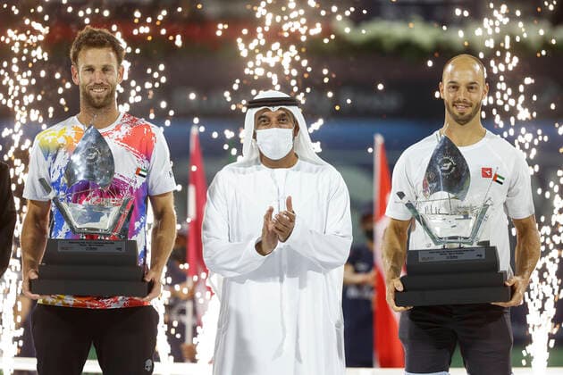 Mens doubles winner L R Tim Puetz and Michael Venus with trophy, trophy with Sheikh Ahmed Bin Saeed Al Maktoum in the middle,award ceremony, presentation Copyright: xJuergenxHasenkopfx