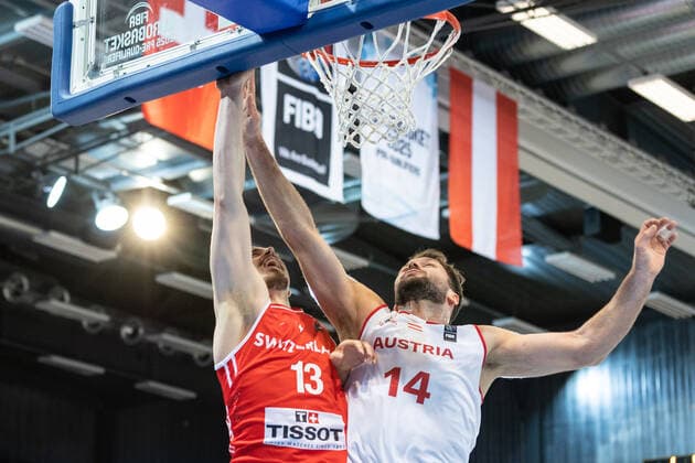 27 02 2022, Fribourg, Hall St Leonard, FIBA Men x92 s EuroBasket 2025 Pre Qualification Switzerland Austria, 13 Killian Martin Switzerland face Ã 14 Jozo Rados Austria Fribourg Hall St Leonard Fribourg Switzerland  Copyright: xJustPictures.ch SirianexDavetx