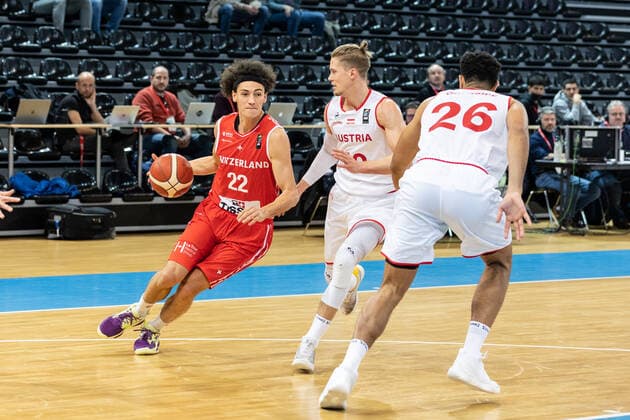 27 02 2022, Fribourg, Hall St Leonard, FIBA Men x92 s EuroBasket 2025 Pre Qualification Switzerland Austria, 22 Marco Portannese Switzerland face Ã 10 Thomas Klepeisz Austria Fribourg Hall St Leonard Fribourg Switzerland  Copyright: xJustPictures.ch SirianexDavetx