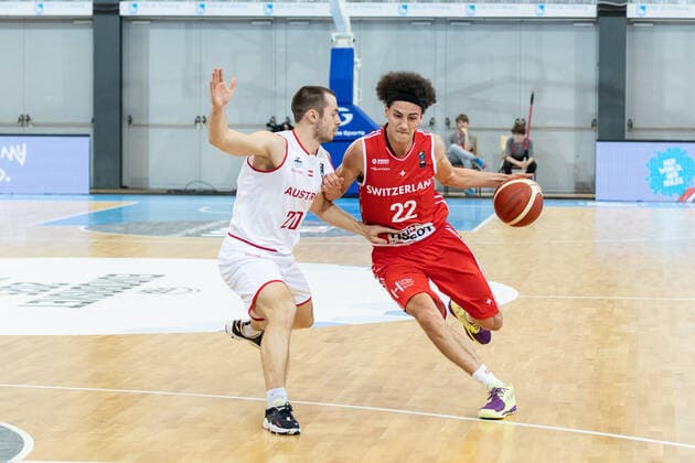 27 02 2022, Fribourg, Hall St Leonard, FIBA Men x92 s EuroBasket 2025 Pre Qualification Switzerland Austria, 22 Marco Portannese Switzerland face Ã 20 Jakob Szkutta Austria Fribourg Hall St Leonard Fribourg Switzerland  Copyright: xJustPictures.ch SirianexDavetx