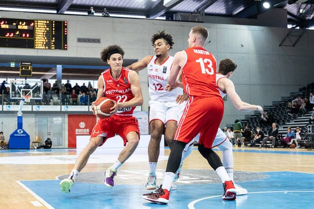 27 02 2022, Fribourg, Hall St Leonard, FIBA Men x92 s EuroBasket 2025 Pre Qualification Switzerland Austria, 22 Marco Portannese Switzerland et 13 Killian Martin Switzerland face Ã 12 Guylain Mbemba Austria Fribourg Hall St Leonard Fribourg Switzerland  Copyright: xJustPictures.ch SirianexDavetx