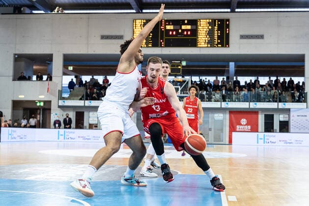 27 02 2022, Fribourg, Hall St Leonard, FIBA Men x92 s EuroBasket 2025 Pre Qualification Switzerland Austria, 13 Killian Martin Switzerland face Ã 26 Marvin Ogunsipe Austria Fribourg Hall St Leonard Fribourg Switzerland  Copyright: xJustPictures.ch SirianexDavetx