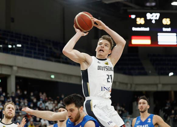 28 02 2022, Germany vs Israel, FIBA Basketball World Cup Qualifiers, Group D, GER, Heidelberg, SNP dome, Picture from the left side , Tamir Blatt Israel and Justus Hollatz Germany Copyright: HMBxMedia xHeikoxBecker