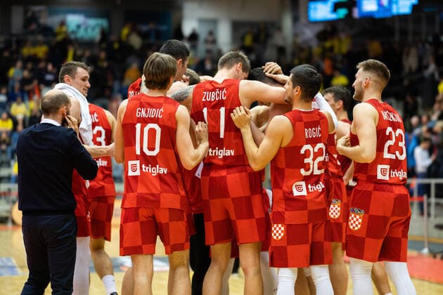 220228 Players of Croatia celebrate after the FIBA World Cup Qualifier game between Sweden and Croatia on February 28, 2022 in Norrköping,  Copyright: PETERxHOLGERSSON BB220228PH055