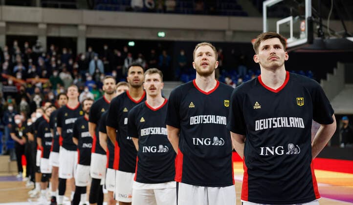 28 02 2022, Germany vs Israel, FIBA Basketball World Cup Qualifiers, Group D, GER, Heidelberg, SNP dome, Picture The German players at the national anthem, front to back, David Kraemer Germany , Christian Sengfelder Germany , Andreas Obst Germany , Johannes Thiemann Germany , Justus Hollatz Germany , Jonas Wohlfarth Bottermann Germany , Bastian Doreth Germany , Robin Benzing Germany , Michael Kessens Germany , Maximilian DiLeo Germany , Maodo Lo Germany Copyright: HMBxMedia xHeikoxBecker