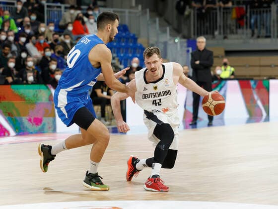 28 02 2022, Germany vs Israel, FIBA Basketball World Cup Qualifiers, Group D, GER, Heidelberg, SNP dome, Picture from the left side , Nimrod Levi Israel and Andreas Obst Germany Copyright: HMBxMedia xHeikoxBecker