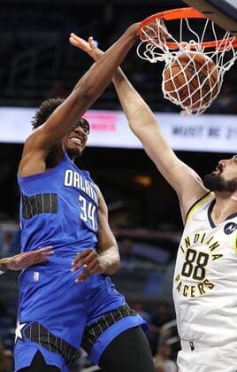 March 2, 2022, Orlando, Florida, USA: Orlando Magic forward Wendell Carter Jr. (34) slam dunks over Indiana Pacers center Goga Bitzdze (88) at the Amway Center on Wednesday, March 2, 2022, in Orlando, Florida. Orlando USA - ZUMAm67_ 0152558640st Copyright: xStephenxM.xDowellx