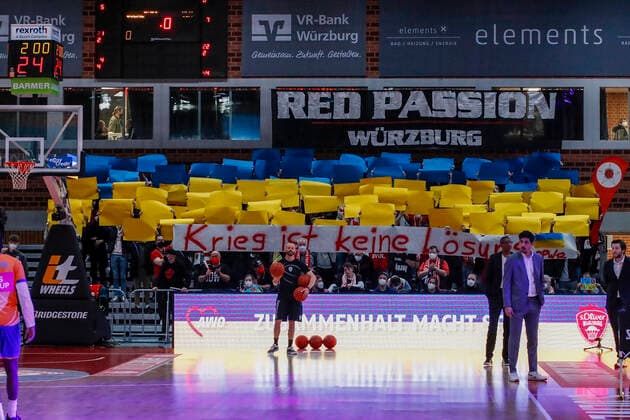 04 03 2022, s Oliver Wuerzburg vs ratiopharm Ulm, easyCredit BBL, 23 matchday, GER, Wuerzburg, tectake Arena, In the picture The fans of s Oliver Wuerzburg present a choreography as a sign against the war in Ukraine Copyright: HMBxMedia xJulienxBecker