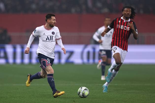 Nice, France, 5th March 2022. Lionel Messi of PSG is pursued by Khephren Thuram of OGC Nice during the Uber Eats Ligue 1 match at Allianz Riviera Stadium, Nice. Picture credit should read: Jonathan Moscrop Sportimage EDITORIAL USE ONLY. No use with unauthorised audio, video, data, fixture lists, club league logos or live services. Online in-match use limited to 120 images, no video emulation. No use in betting, games or single club league player publications. SPI-1565-0001
