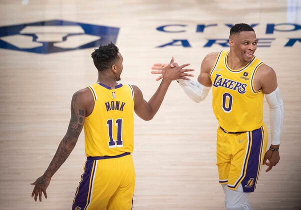 March 5, 2022, Los Angeles, California, USA: Russell Westbrook 0 of the Los Angeles Lakers celebrates with Malik Monk 11 after scoring during their NBA, Basketball Herren, USA game against the Golden State Warriors on Saturday March 5, 2022 at Crypto.com Arena in Los Angeles, California. Lakers defeat Warriors, 124-116. PI Los Angeles USA - ZUMAp124 20220305_zaa_p124_047 Copyright: xJAVIERxROJASx