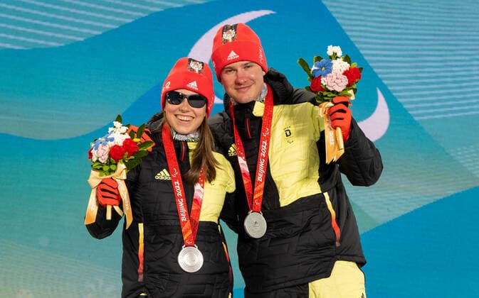 Paralympics Beijing 2022 Super G Beijing CHINA 06 03 22 Competition Day 2 Zhangjiakou Medal Plaza Award Ceremony Para Biathlon Sprint WALTER, Leonie GER of SC St Peter BAD , born 17 10 2004 in Freiburg, Paralympic classification B2 and STRECKER, Pirmin GER of SV Kirchzarten BAD , born 17 06 2002 in Freiburg, Paralympic classification Guide Leonie Walter win Bronze Credit Ralf Kuckuck, DBS Yanging National Alpine Ski Center China