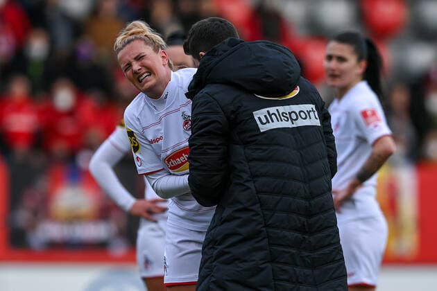 Rachel Rinast Cologne, 31 needs treatment on arm, racked with pain after foul, 06 03 2022, Munich Germany , Football, Flyeralarm Womens Bundesliga, FC Bayern Munich 1 FC Cologne, DFB DFL REGULATES PROHIBIT ANY USE OF PHOTOGRAPHS AS IMAGE SEQUENCES AND OR QUASI VIDEO xslx