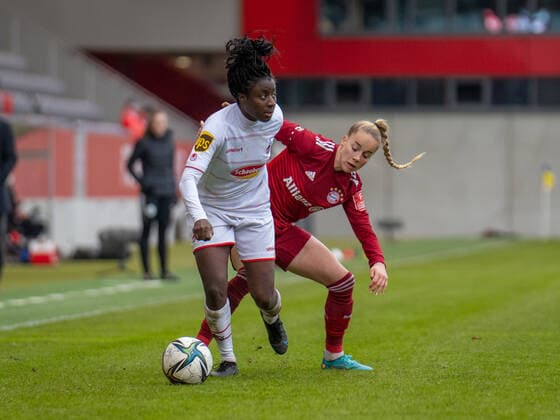 Eunice Beckmann 11 FC Cologne and Giulia Gwinn 7 FC Bayern Munich in action at the Flyeralarm womens Bundesliga match FC Bayern Munich 1 FC Cologne on 06 03 2022