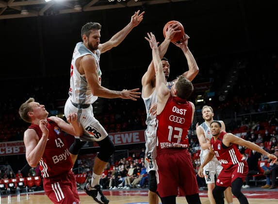 06 03 2022, BBL, FC Bayern Muenchen vs Brose Bamberg, Audi Dome Muenchen, basketball, sports, in the picture Leon Radosevic FCB Basketball , Tomas Kyzlink Brose Bamberg , Shannon Scott Brose Bamberg , Christian Sengfelder Brose Bamberg and Augustine Rubit FCB Basketball