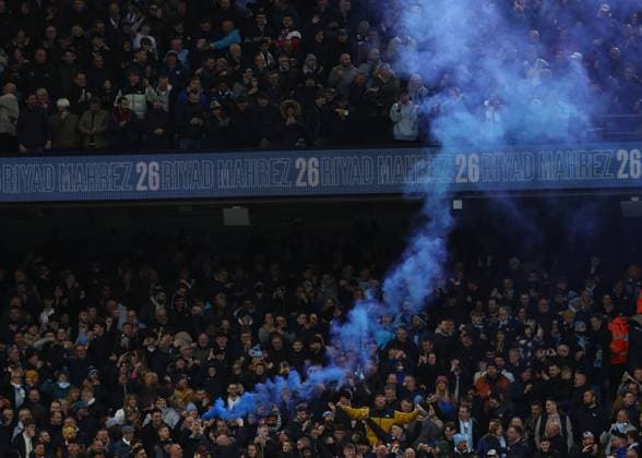 Manchester, England, 6th March 2022. Fans react after Riyad Marhez of Manchester City scores his first goal during the Premier League match at the Etihad Stadium, Manchester. Picture credit should read: Darren Staples Sportimage EDITORIAL USE ONLY. No use with unauthorised audio, video, data, fixture lists, club league logos or live services. Online in-match use limited to 120 images, no video emulation. No use in betting, games or single club league player publications. SPI-1569-0143