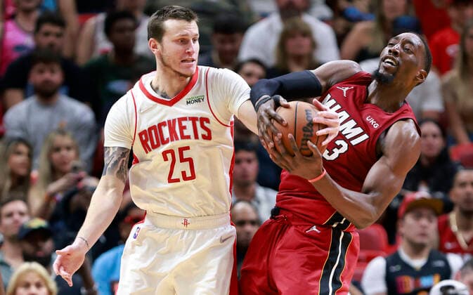 Sport Bilder des Tages Miami Heat center Bam Adebayo (R) and Houston Rockets guard Garrison Mathews (L) fight for a loose ball during the second half of the NBA, Basketball Herren, USA basketball game between the Miami Heat and the Houston Rockets at FTX Arena in Miami, Florida, USA, 07 March 2022. Miami Heat vs Houston Rockets !ACHTUNG: NUR REDAKTIONELLE NUTZUNG!  Copyright: xRHONAxWISEx AME1336 20220308-c9e6048ef27ca2deb39b232a88dc33151c83b28b