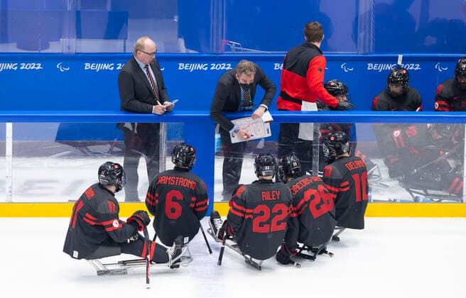 (220308) -- BEIJING, March 8, 2022 -- Players of Canada react with their coach during the Preliminary Round Group A Match of Para Ice hockey, Eishockey between Canada and South Korea at Beijing 2022 Winter Paralympic Games in Beijing, capital of China, March 8, 2022. ) (SP)CHINA-BEIJING-WINTER PARALYMPICS-PARA ICE HOCKEY-GROUP A-CAN VS KOR(CN) CaixYang 