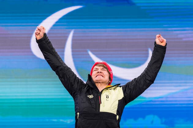 Yanqing China Medal Plaza 08 03 2022 Para Alpine Skiing FORSTER, Anna Lena GER from BRSV Radolfzell BAD cheers on winning the gold medal at the award ceremony in the Women™s Super Combined competition, downhill and slalom Credit Mika Volkmann.