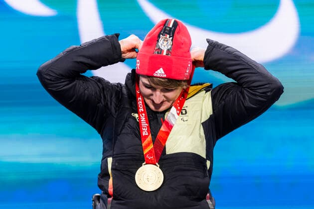Yanqing China Medal Plaza 08 03 2022 Para Alpine Skiing FORSTER, Anna Lena GER from BRSV Radolfzell BAD cheers on winning the gold medal at the award ceremony in the Women™s Super Combined competition, downhill and slalom Credit Mika Volkmann.