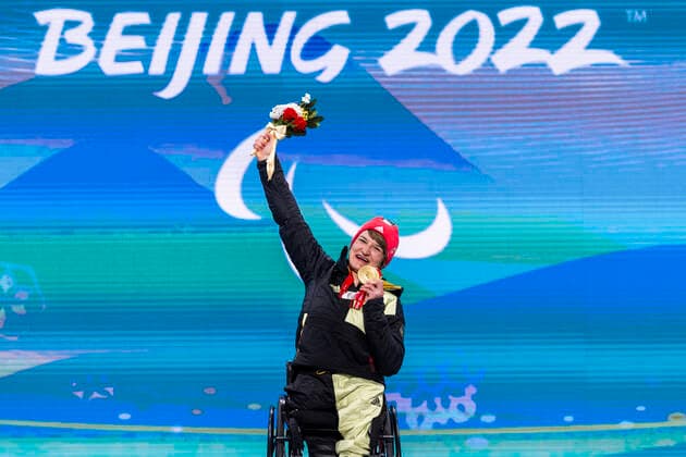 Yanqing China Medal Plaza 08 03 2022 Para Alpine Skiing FORSTER, Anna Lena GER from BRSV Radolfzell BAD cheers on winning the gold medal at the award ceremony in the Women™s Super Combined competition, downhill and slalom Credit Mika Volkmann.