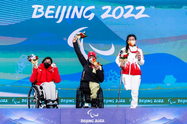 Yanqing China Medal Plaza 08 03 2022 Para Alpine Skiing FORSTER, Anna Lena GER from BRSV Radolfzell BAD cheers on winning the gold medal at the award ceremony in the Women™s Super Combined competition, downhill and slalom Credit Mika Volkmann.