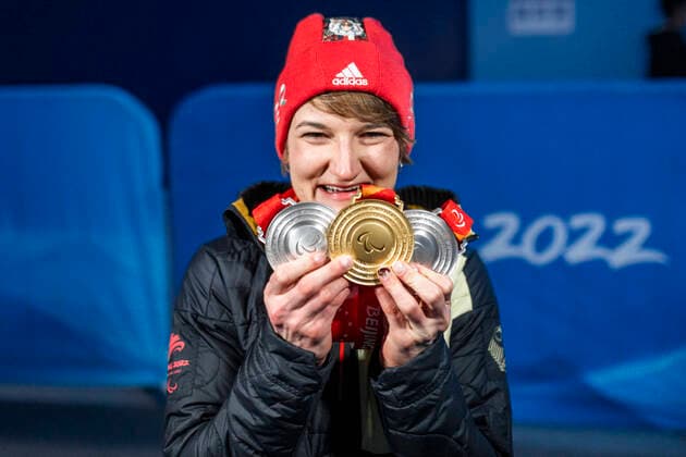 Yanqing China Medal Plaza 08 03 2022 Para Ski Alpin FORSTER, Anna Lena GER from BRSV Radolfzell BAD cheers about winning the gold medal at the award ceremony in the Women™s Super Combined competition, downhill and slalom Afterwards she shows her other two silver medals Credit Mika Volkmann