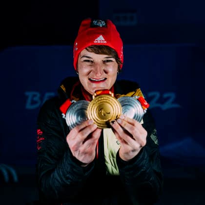Yanqing China Medal Plaza 08 03 2022 Para Ski Alpin FORSTER, Anna Lena GER from BRSV Radolfzell BAD cheers about winning the gold medal at the award ceremony in the Women™s Super Combined competition, downhill and slalom Afterwards she shows her other two silver medals Credit Mika Volkmann
