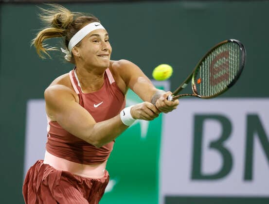 March 08, 2022 Aryna Sabalenka of Belarus returns a shot against Simona Halep of Romania during the Eisenhower Cup of the 2022 BNP Paribas Open at Indian Wells Tennis Garden in Indian Wells, California. Mandatory Photo Credit : CSM. Indian Wells United States of America - ZUMAc04_ 20220308_zaf_c04_176 Copyright: xCharlesxBausx