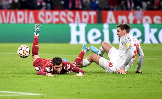 FOOTBALL CHAMPIONS LEAGUE SEASON 2021 2022 Round of 16 second leg FC Bayern Muenchen FC Salzburg 08 03 2022 Penalty after foul on Robert Lewandowski li, FC Bayern Muenchen by Maximilian Woeber re, FC Salzburg